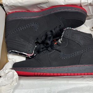 Jordan Retro 1 Black and Red High-Top Sneakers